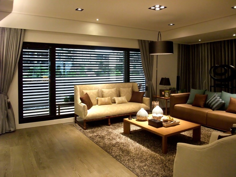 External sunshade louver seen from the inside &mdash; adjustable blades cut glare while keeping daylight and the outward view